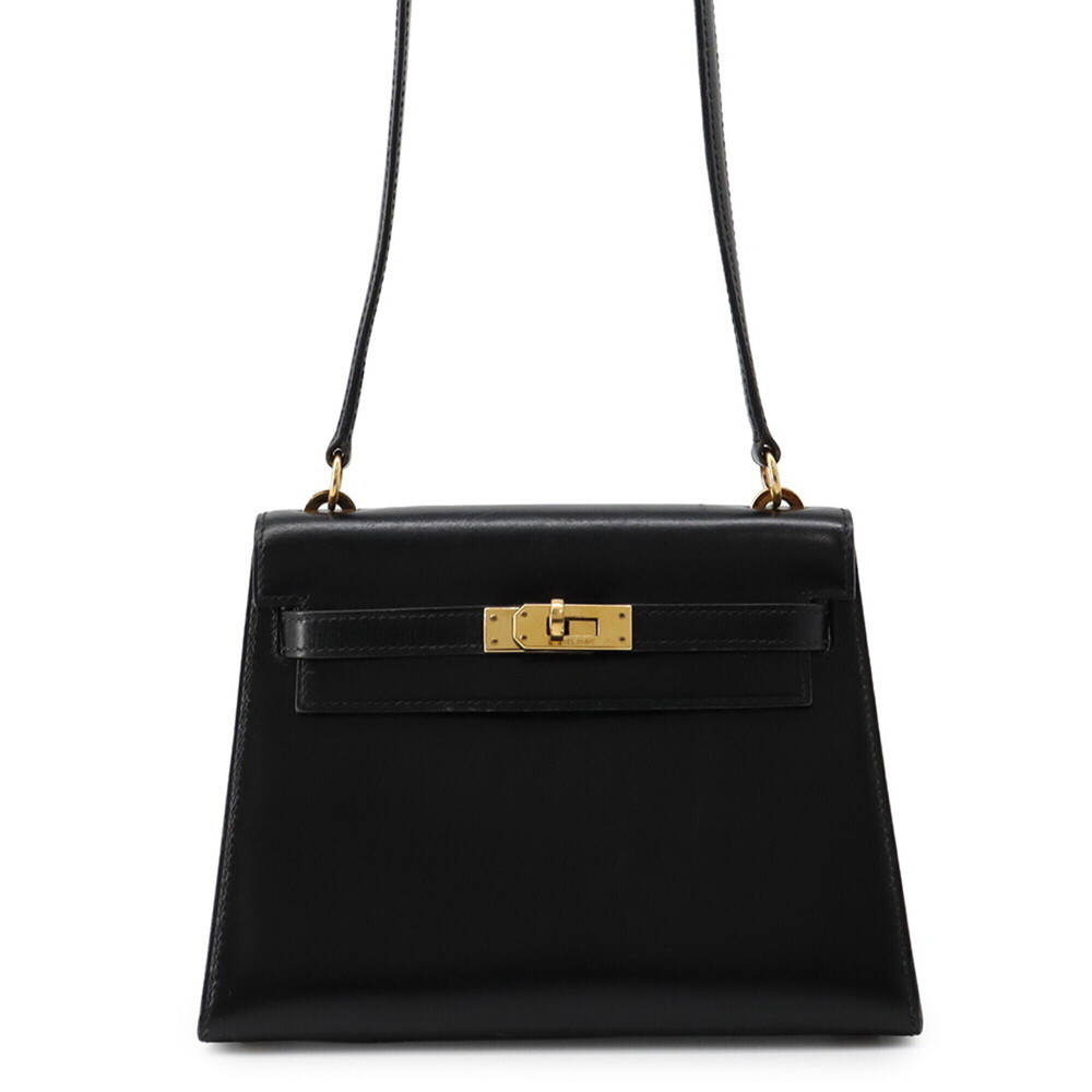 Hermes Mini Kelly handbag, black box calf leather, with S stamp. HERMES 2-way...